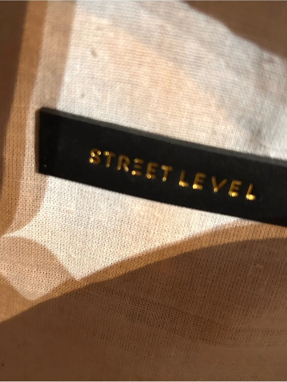 Street Level Round Woven Crossbody Bag in Brown